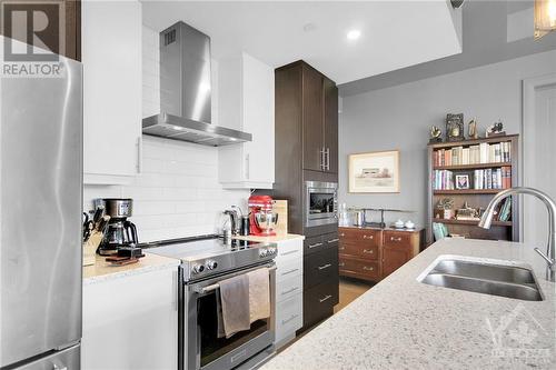 101 Cortile Private Unit#402, Ottawa, ON - Indoor Photo Showing Kitchen With Double Sink