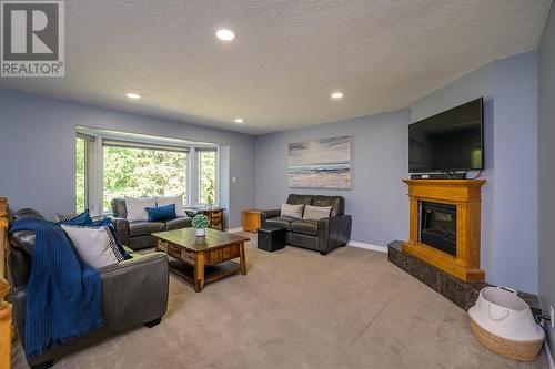 4245 Hobby Drive, Prince George, BC - Indoor Photo Showing Living Room With Fireplace