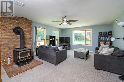 4245 Hobby Drive, Prince George, BC - Indoor Photo Showing Living Room With Fireplace