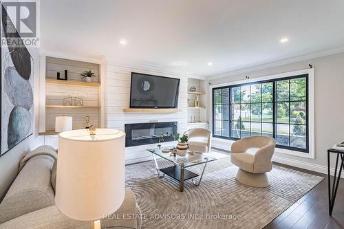 203 Browning Trail, Barrie (400 North), ON - Indoor Photo Showing Living Room With Fireplace