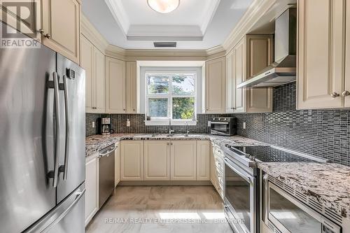 107 - 9909 Pine Valley Drive, Vaughan (Vellore Village), ON - Indoor Photo Showing Kitchen With Stainless Steel Kitchen With Upgraded Kitchen