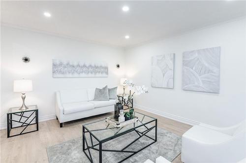 new floors, lights - 3045 Portage Road, Niagara Falls, ON - Indoor Photo Showing Living Room