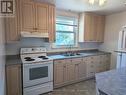 163 East 42Nd Street, Hamilton (Sunninghill), ON  - Indoor Photo Showing Kitchen With Double Sink 