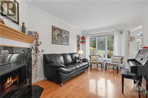 87 Grenadier Way, Ottawa, ON - Indoor Photo Showing Living Room With Fireplace