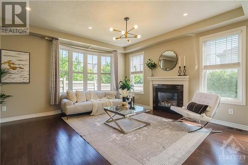 175 Lily Pond Street, Ottawa, ON - Indoor Photo Showing Living Room With Fireplace