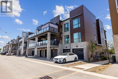 212 - 2375 Bronte Road E, Oakville, ON - Outdoor With Facade