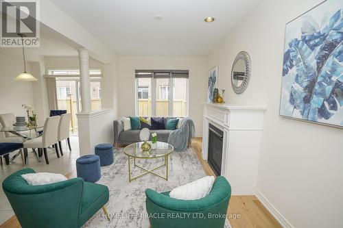 25 Dale Meadows Road, Brampton, ON - Indoor Photo Showing Living Room With Fireplace