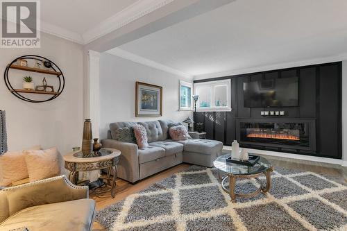 5216 Champlain Trail, Mississauga (Hurontario), ON - Indoor Photo Showing Living Room With Fireplace