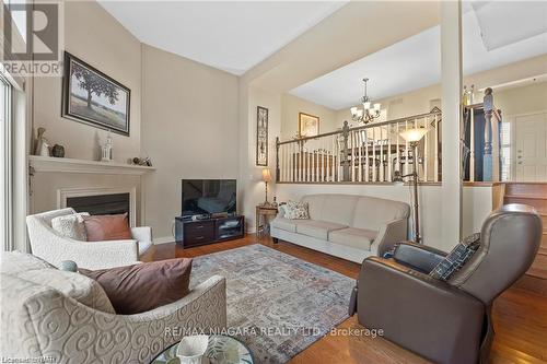 41 - 15 Lakeside Drive, St. Catharines, ON - Indoor Photo Showing Living Room With Fireplace