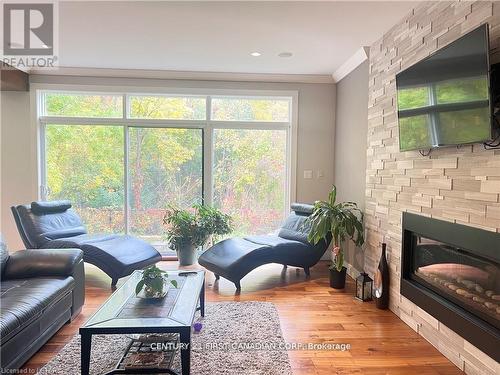 2084 North Routledge Park, London, ON - Indoor Photo Showing Living Room With Fireplace