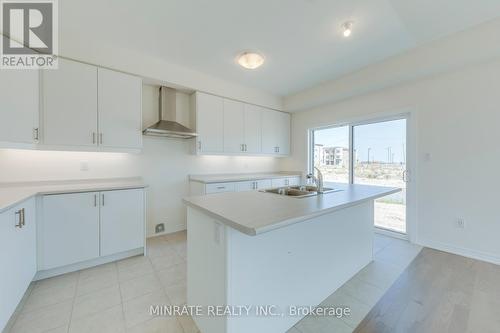 62 Delano Way, Newmarket, ON - Indoor Photo Showing Kitchen With Double Sink