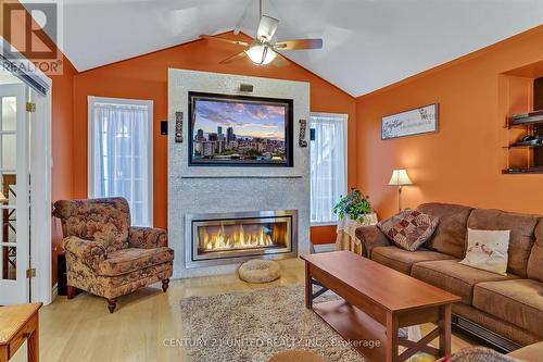 10115 County 28 Road, Hamilton Township, ON - Indoor Photo Showing Living Room With Fireplace