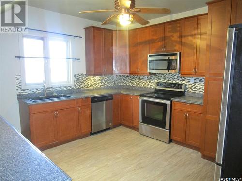 106 2Nd Street W, Lafleche, SK - Indoor Photo Showing Kitchen With Double Sink