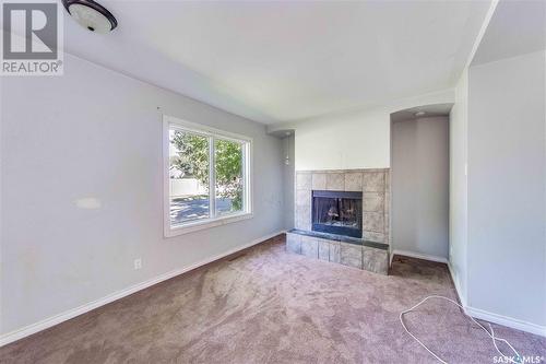 622 31St Street W, Saskatoon, SK - Indoor Photo Showing Living Room With Fireplace