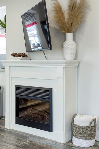 16 Munn Street, Hamilton, ON - Indoor Photo Showing Living Room With Fireplace