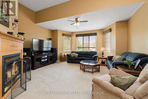 168 Binder Twine Trail, Brampton (Fletcher'S Creek Village), ON - Indoor Photo Showing Living Room With Fireplace