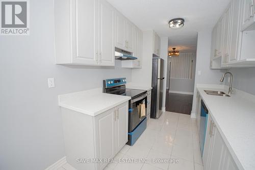 #1101 - 17 Knightsbridge Road, Brampton (Queen Street Corridor), ON - Indoor Photo Showing Kitchen With Double Sink