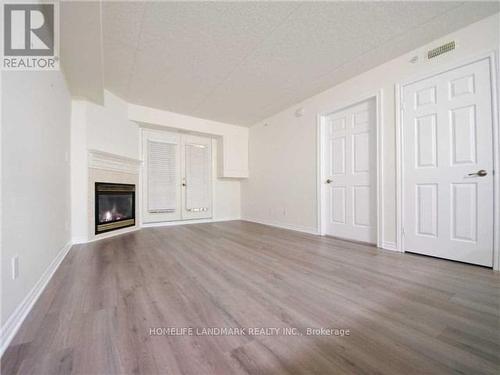 304 - 1440 Bishop Gate, Oakville, ON - Indoor With Fireplace