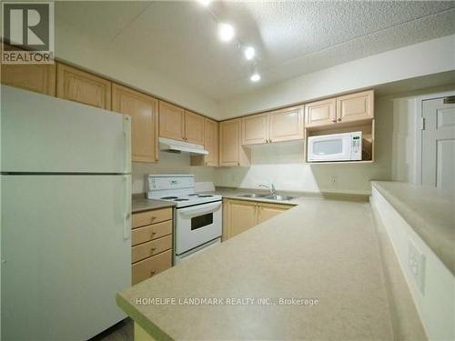 304 - 1440 Bishop Gate, Oakville, ON - Indoor Photo Showing Kitchen With Double Sink