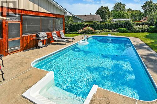 121 Queen Street, Kawartha Lakes, ON - Outdoor With In Ground Pool With Backyard