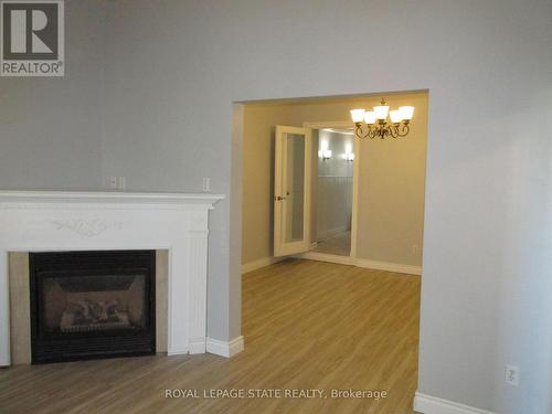 86 Earl Street, Hamilton (Gibson), ON - Indoor Photo Showing Living Room With Fireplace