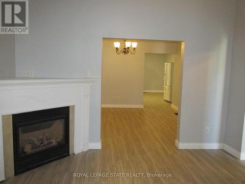 86 Earl Street, Hamilton (Gibson), ON - Indoor Photo Showing Living Room With Fireplace