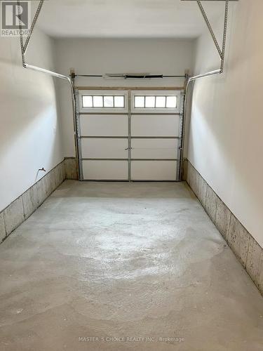 30 Floodgate Road, Whitby, ON - Indoor Photo Showing Garage