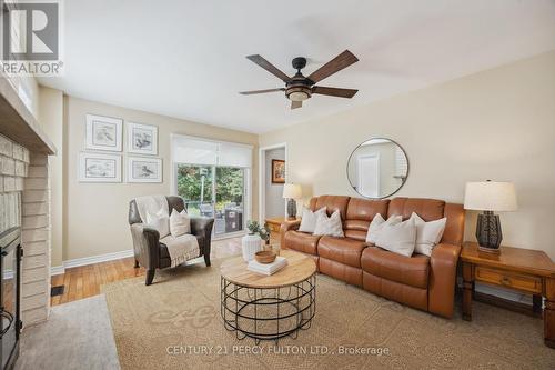 28 White Cliffe Drive, Clarington (Courtice), ON - Indoor Photo Showing Living Room With Fireplace