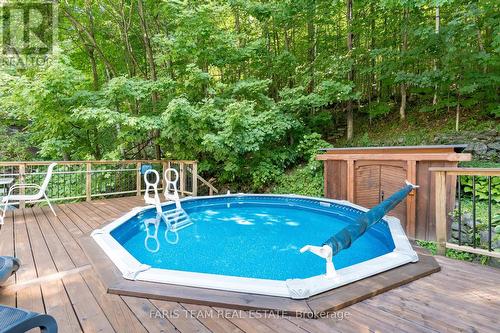 119 Silver Birch Drive, Tiny, ON - Outdoor With Above Ground Pool With Deck Patio Veranda