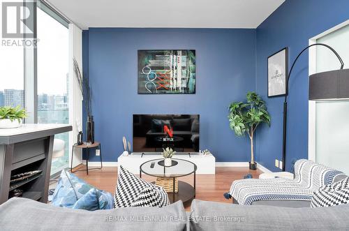 3005 - 12 York Street, Toronto, ON - Indoor Photo Showing Living Room With Fireplace