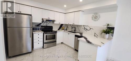 6 - 83 Mondeo Drive E, Toronto (Dorset Park), ON - Indoor Photo Showing Kitchen