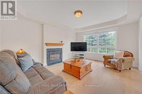 2343 Calloway Drive, Oakville, ON - Indoor Photo Showing Living Room With Fireplace