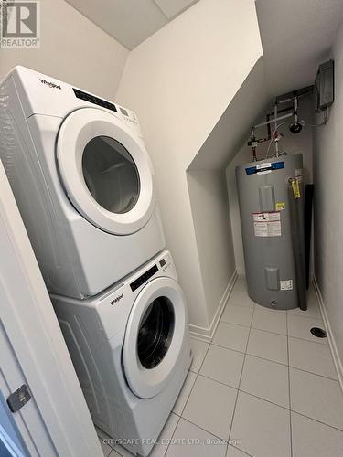 219 - 1660 Victoria Park Avenue E, Toronto (Victoria Village), ON - Indoor Photo Showing Laundry Room