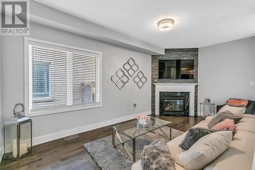 2132 Osbond Road, Innisfil (Alcona), ON - Indoor Photo Showing Living Room With Fireplace