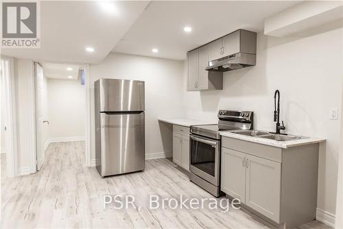 Lower - 37 Broughton Terrace, Bradford West Gwillimbury, ON - Indoor Photo Showing Kitchen With Double Sink