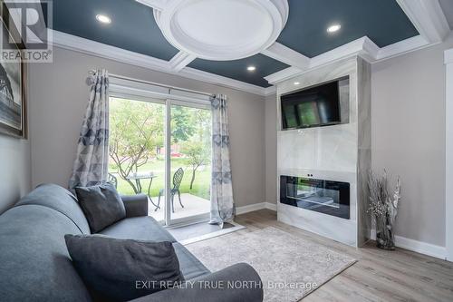 K1 - 155 Edgehill Drive, Barrie, ON - Indoor Photo Showing Living Room With Fireplace