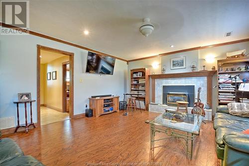 1268 County Rd 20 West, Kingsville, ON - Indoor Photo Showing Living Room With Fireplace