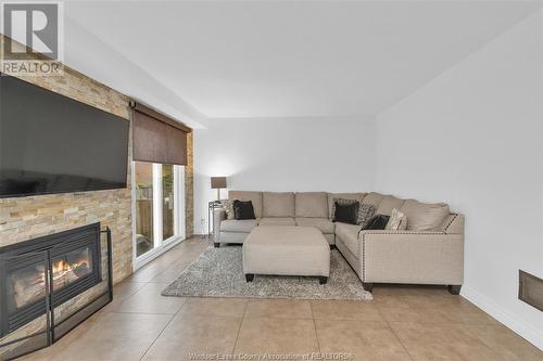 3933 Riverside Drive East, Windsor, ON - Indoor Photo Showing Living Room With Fireplace