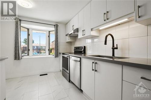 907 Elmsmere Road Unit#A, Ottawa, ON - Indoor Photo Showing Kitchen With Double Sink With Upgraded Kitchen