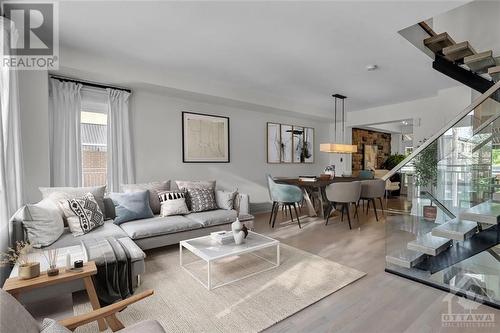 Virtually Staged - 100 Tay Street, Ottawa, ON - Indoor Photo Showing Living Room