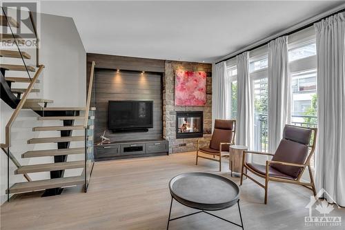 100 Tay Street, Ottawa, ON - Indoor Photo Showing Living Room With Fireplace