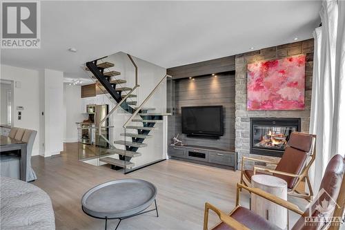 100 Tay Street, Ottawa, ON - Indoor Photo Showing Living Room With Fireplace