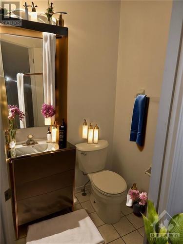 Powder room main floor. - 6421 Beausejour Drive, Ottawa, ON - Indoor Photo Showing Bathroom