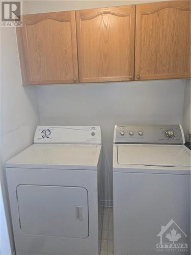 Washer and dryer  main floor. - 6421 Beausejour Drive, Ottawa, ON - Indoor Photo Showing Laundry Room