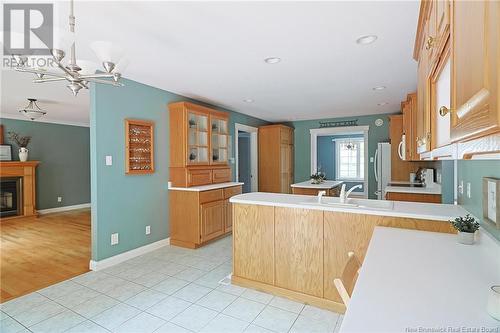 52 Maclean Court, Fredericton, NB - Indoor Photo Showing Kitchen With Fireplace