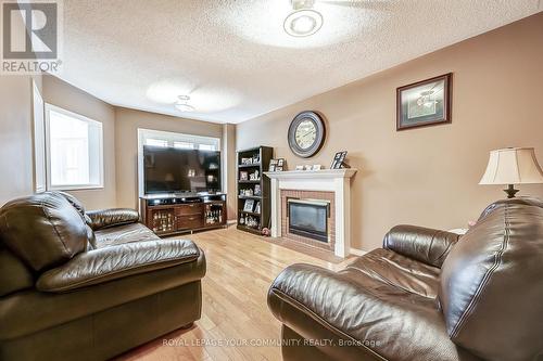 87 Song Bird Drive, Markham (Rouge Fairways), ON - Indoor Photo Showing Living Room With Fireplace