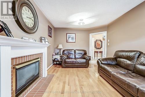 87 Song Bird Drive, Markham (Rouge Fairways), ON - Indoor Photo Showing Living Room With Fireplace