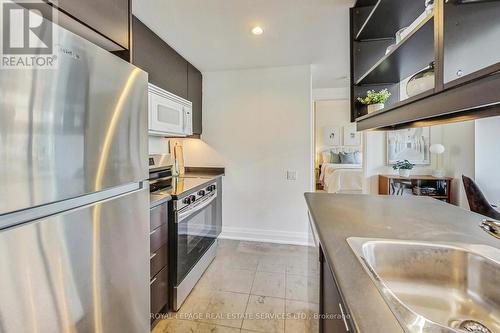 705 - 383 Ellis Park Road, Toronto, ON - Indoor Photo Showing Kitchen