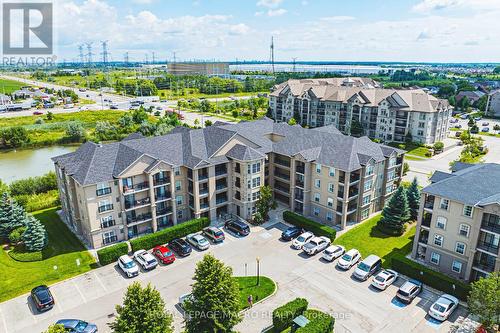 212 - 1491 Maple Avenue, Milton (Dempsey), ON - Outdoor With Facade