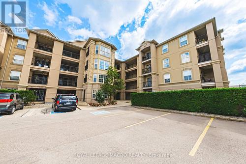 212 - 1491 Maple Avenue, Milton (Dempsey), ON - Outdoor With Balcony With Facade